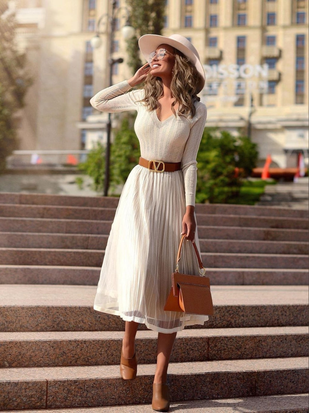 Hunter Bell Dress: Celebrating Feminine Elegance with Designer Dresses
