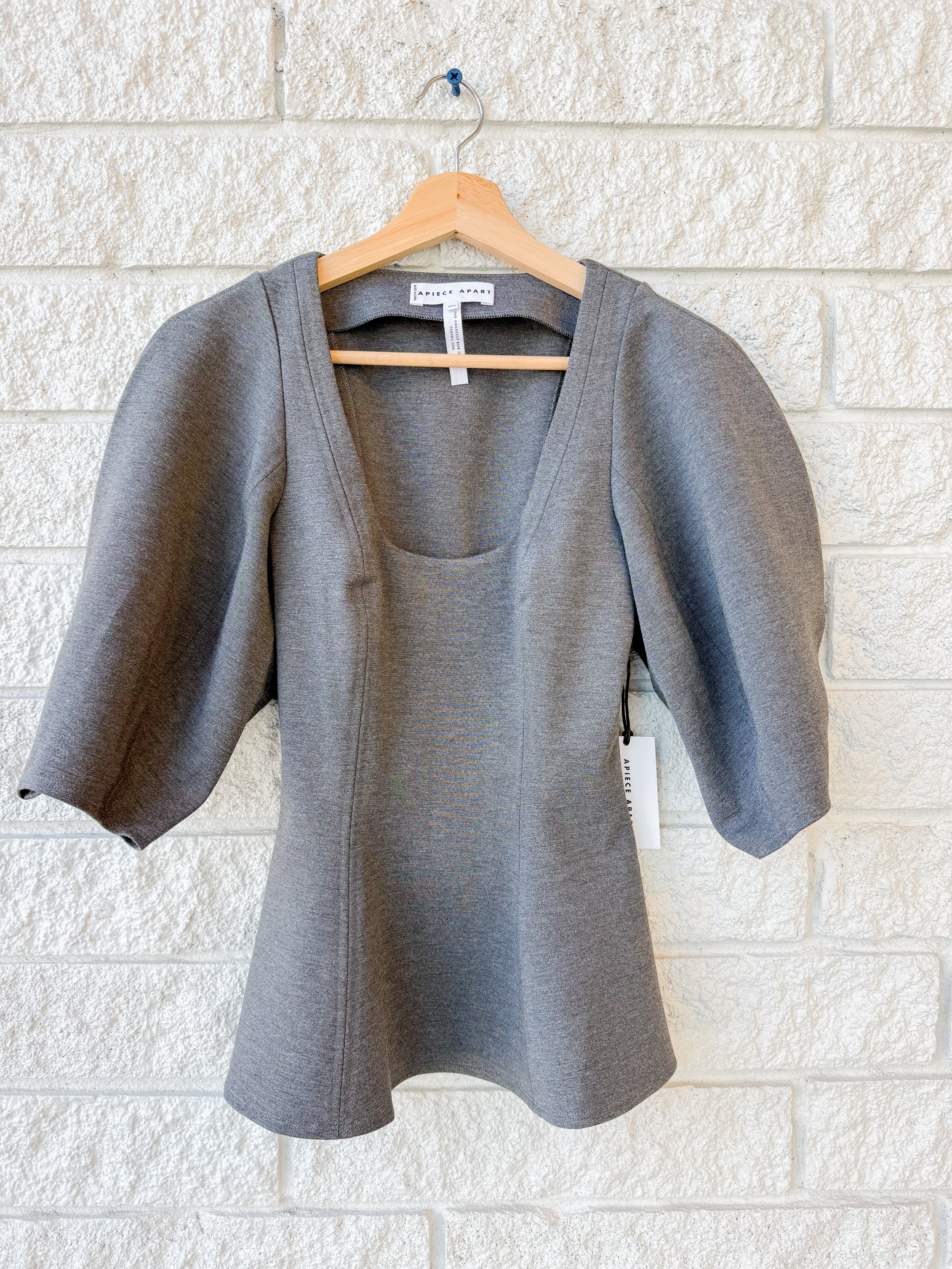 Bebe Ponte Peplum Top