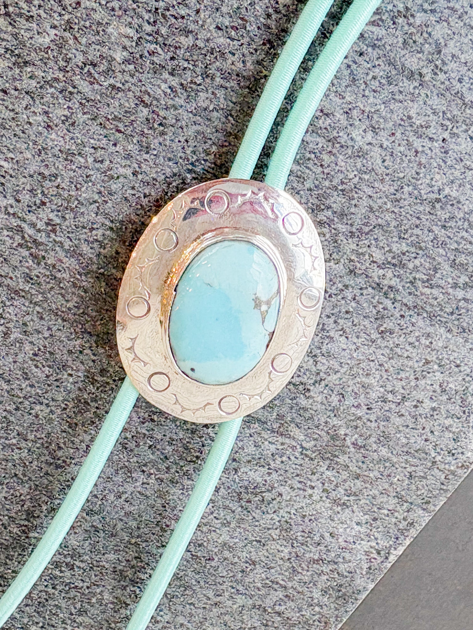 Bolo with Aqua Cord
