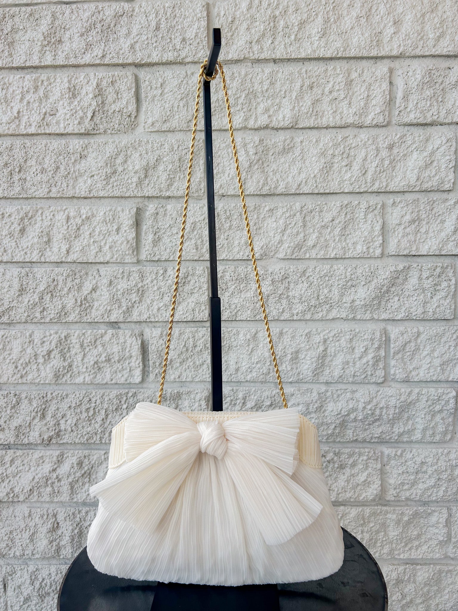 Rayne Pleated Bow Clutch