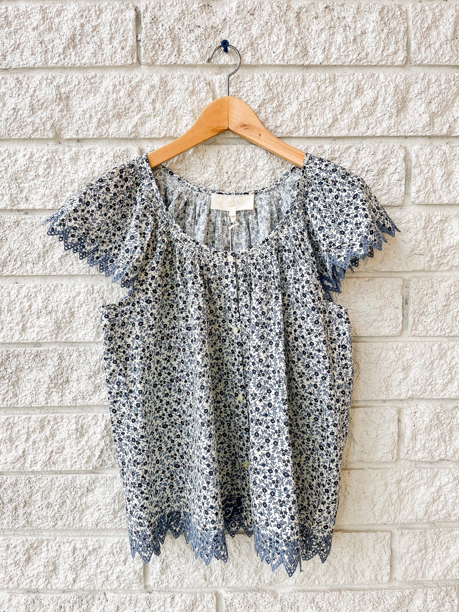 The Flutter Sleeve Eyelet Top