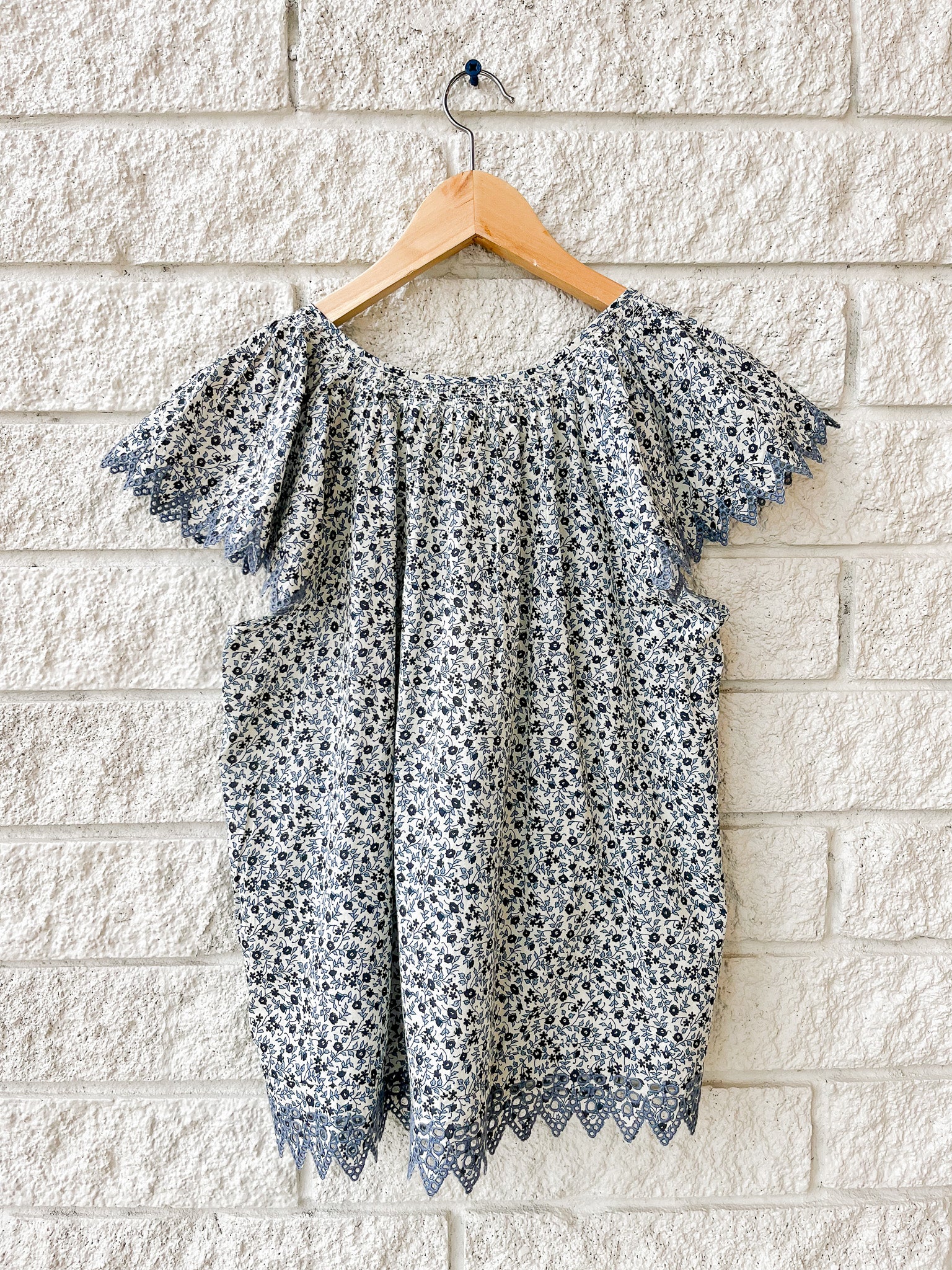 The Flutter Sleeve Eyelet Top